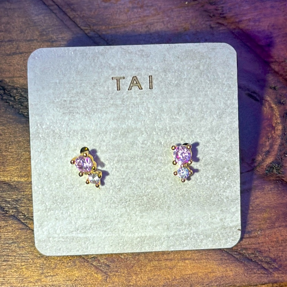 NWOT. Woman’s TAI mini stoned earrings. With pink and white stone.